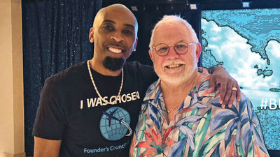 David McCovy (left), founder of Evolution Travel, and Ron Archer, CEO of Archer Travel Service.