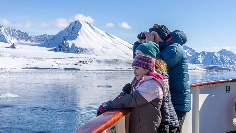 Hurtigruten guests viewing Arctic landscapes near Svalbard.