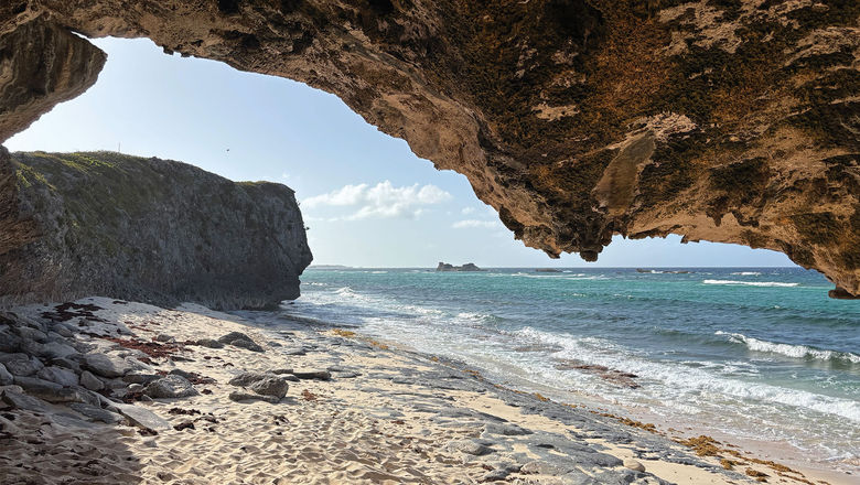 The secret beaches and caves at Mudjin Harbour are just a short stroll from the Dragon Cay Resort on Middle Caicos.