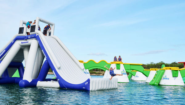 The 20-foot Ewa Slider features a "kicker" exit that launches riders in the air before they drop into the lagoon.