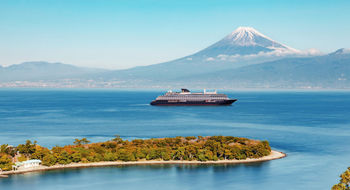 The tranquil seaside village of Osezaki and its protected waters in Suruga Bay with Mount Fuji in the background.