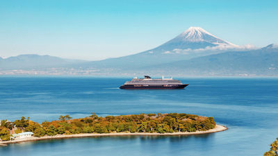 The tranquil seaside village of Osezaki and its protected waters in Suruga Bay with Mount Fuji in the background.