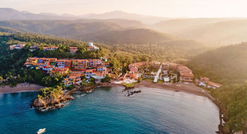 Villas perched above the beach at Careyes, one of Mexico's original master-planned luxury communities.