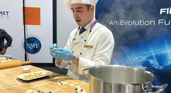Turkish Airlines chef Demir Duzel demonstrates how to prepare manti at the IFSA trade show.