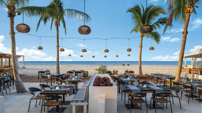 Wymara Villas + Beach Club's beachfront Blue Water Bistro, where the cuisine reflects various parts of the Caribbean.