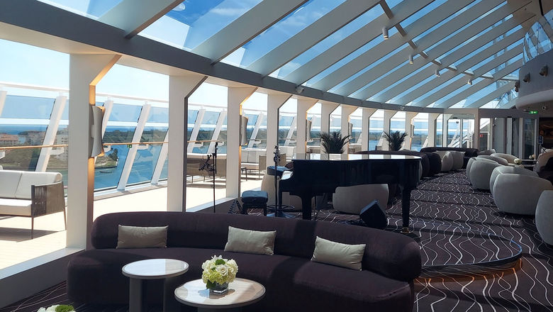 A seating space in the Yacht Club section of the MSC World America. The Yacht Club will be introduced on the MSC Poesia in 2026.