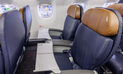 The first-class cabin on a refreshed American Airlines Embraer regional jet.