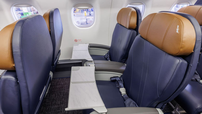 The first-class cabin on a refreshed American Airlines Embraer regional jet.