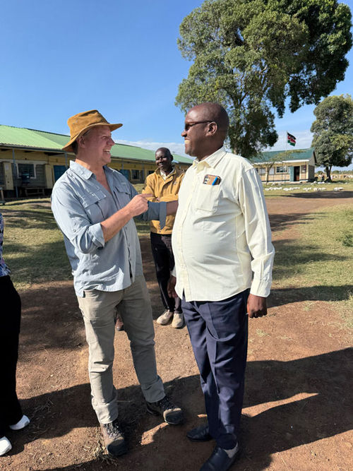 A&K Philanthropy executive director Keith Sproule (left) and Partakilat head teacher Daniel Rokoi.