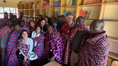 Abercrombie & Kent's philanthropy team at the dedication of a school library A&K Philanthropy built in the Maasai Mara.
