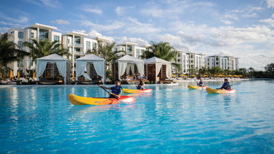 Guests in kayaks at the Evermore Orlando Resort.