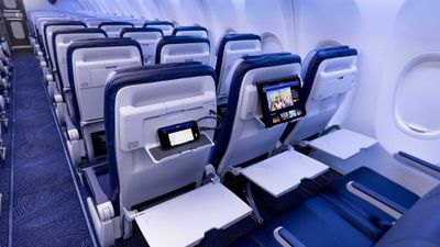 Southwest Airlines' new cabin features power at every seat and seatback holders for personal electronic devices.