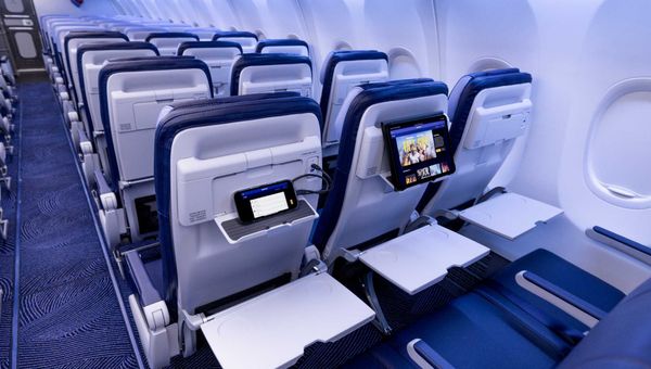 Southwest Airlines' new cabin features power at every seat and seatback holders for personal electronic devices.