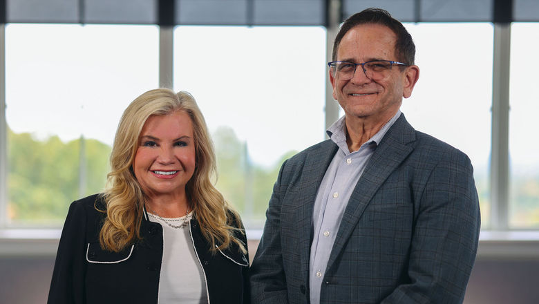 Levarte founder Lori Speers, left, and KHM Travel Group CEO Rick Zimmerman.