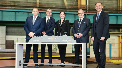 Executives including Royal Caribbean Group CEO Jason Liberty, far left, and Celebrity Cruises President Laura Hodges Bethge, center, at the steel cutting for the Celebrity Xcite.