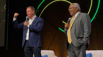 Sandals Resorts International executive chairman Adam Stewart, left, and Gary Sadler, executive vice president of sales and industry relations at Unique Vacations, at CruiseWorld.