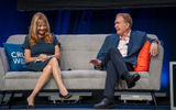 Vicki Freed, Royal Caribbean's senior vice president of sales and trade support and services, on stage at CruiseWorld with Royal Caribbean Group chairman Richard Fain.