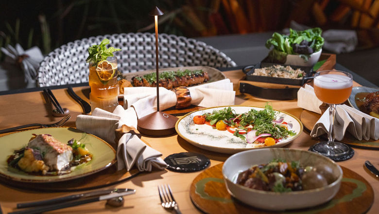 Ko restaurant reopens following redesign with family-style dishes.