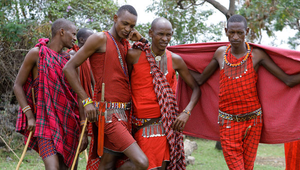 "We wear jeans sometimes when we go to town," one young Masai told editor Dorine Reinstein, "but we prefer our traditional red clothing. The lions recognize us in these colors."