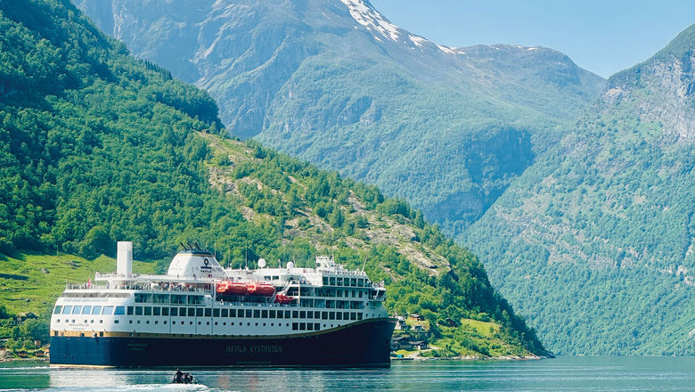The Pollux sailing out of the Geiranger Fjord.