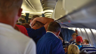 IATA campaign will urge flyers not to retrieve carry-ons during evacuations