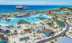 Carnival ships docked at Bahamas private destination Celebration Key.