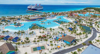 Carnival ships docked at Bahamas private destination Celebration Key.