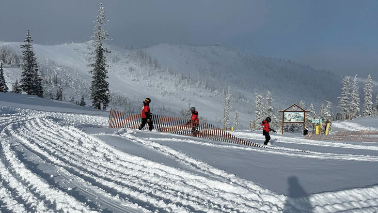 Monarch Mountain ski patrol installs temporary wind fences ahead of an upcoming storm.