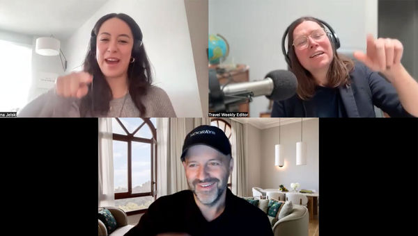 Clockwise from top left: Travel Weekly's Christina Jelski and Rebecca Tobin and Jon Makhmaltchi, the founder of J.Mak hospitality, trace the next letter that could be used to describe traveler trends.
