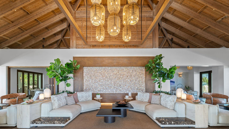 The Sailrock's lobby now centers around a dramatic, LED-lit conch shell art wall.