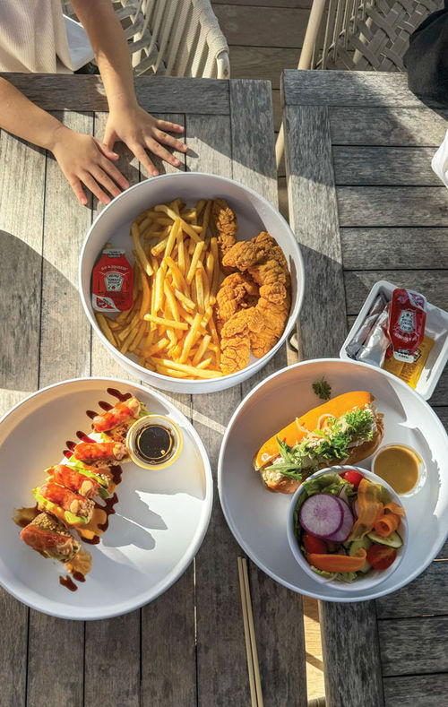 Poolside fare -- crispy tuna and a lobster roll for the parents, chicken tenders and fries for the kids.