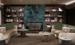 The owner's suite's living space will have custom wool carpeting and a fireplace.