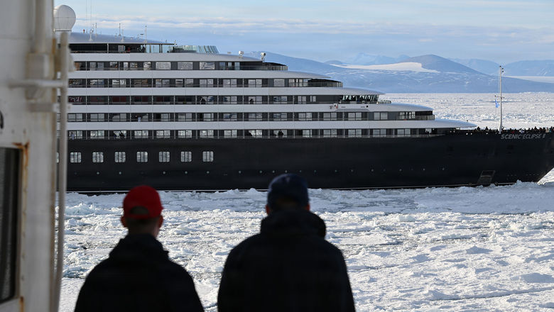 The Scenic Eclipse II receiving Coast Guard assistance in Antarctica.