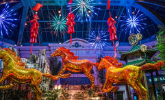 Three gold horses highlight the West Bed of the Bellagio Conservatory, celebrating the Lunar New Year through Feb. 28.