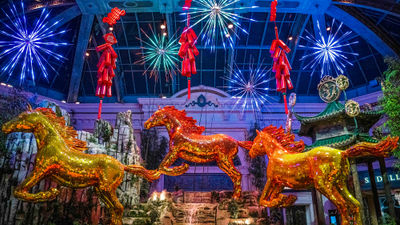 Three gold horses highlight the West Bed of the Bellagio Conservatory, celebrating the Lunar New Year through Feb. 28.