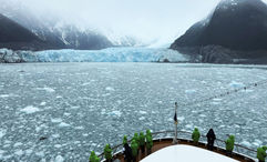 Atlas Ocean Voyages sails yachts that reach some of the tighter corners of the globe. Pictured, glaciers in Chile are seen from a cruise ship.