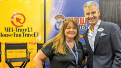 Beci Mahnken, owner of MEI-Travel and Mouse Fan Travel, with Josh D’Amaro at her D23 Expo booth.