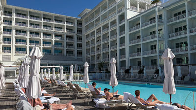 The property is built in a U shape around the main pool.
