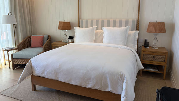 The bedroom design has both contemporary and Old Florida elements. The bedroom design has both contemporary and Old Florida elements.