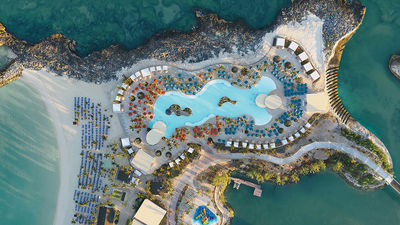 Missteps in private-island development and ship deployments have eroded NCLH's competitive edge with Royal Caribbean Group and Carnival Corp., according to activist investor Elliott Investment Management. Pictured, the pool at Norwegian Cruise Line's Great Stirrup Cay.