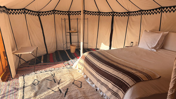 The inside of a tent at Abercrombie & Kent's luxury desert camp in the Sahara.