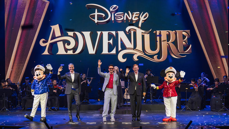 At the Disney Adventure's christening were, from left, incoming Disney CEO Josh D'Amaro, ship godparent Robert Downey Jr., and Disney Signature Experiences president Joe Schott.