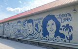 From racing to distilling to history to music, there are old favorites and new options for visitors to the Bluegrass State. A mural in Elizabethtown commemorates famous Kentucky-born figures.