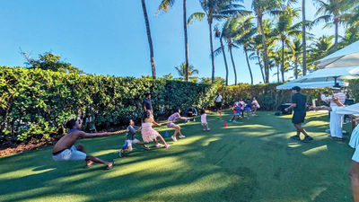 Kids join a game of tug-of-war on the back lawn at the W South Beach.