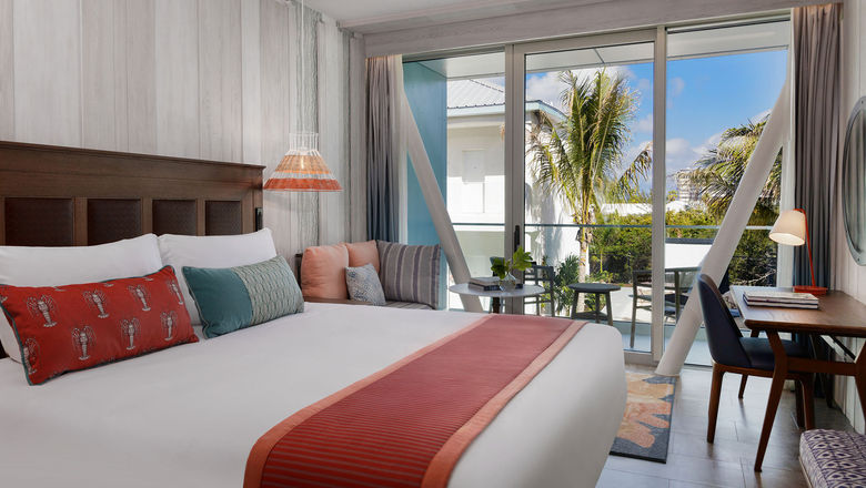 The hotel features what it call a warm, contemporary design with wood-paneled walls, wicker lamps and dark wood bed frames with matching dressers.