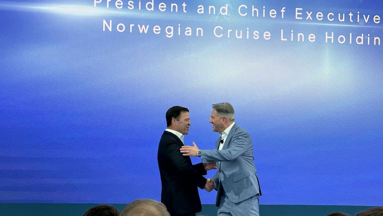 Norwegian Cruise Line Holdings CEO John Chidsey (left) and Norwegian Cruise Line CEO Marc Kazlauskas at the Norwegian Luna's christening ceremony.