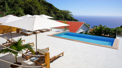 Amenities at the Scenery Hotel include a deck with a plunge pool.