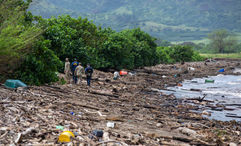 Two back-to-back kona low storms dumped more than 2 trillion gallons of water across the state and severely flooded parts of it.