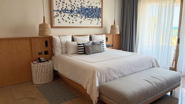 The bedroom in a Preferred Club suite at the Secrets Playa Mujeres Golf & Spa Resort in Cancun. The bedroom in a Preferred Club suite at the Secrets Playa Mujeres Golf & Spa Resort in Cancun.