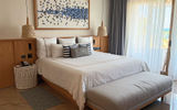 The bedroom in a Preferred Club suite at the Secrets Playa Mujeres.